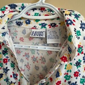 VTG, 80’s Leon Levin Floral stretch Polo Shirt with fitted waistband.